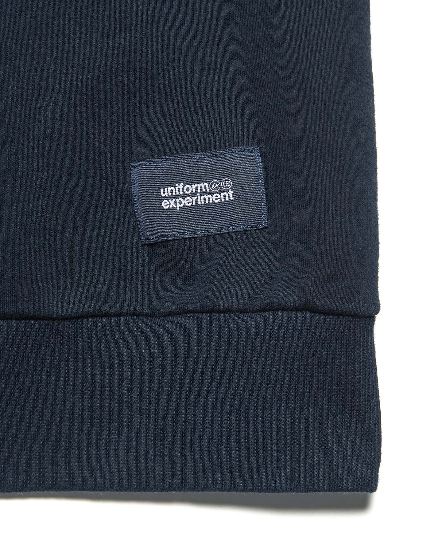 uniform experiment / LINE FLANNEL CHECK PANELED CREWNECK TOP (Blue)タグ